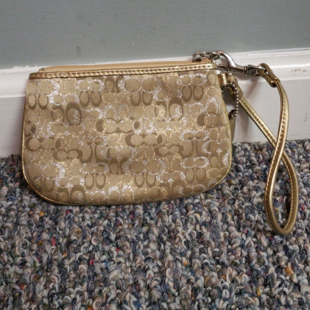 Authentic Coach wristlet never used